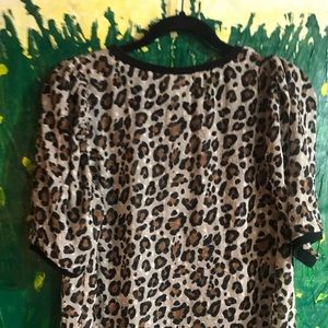 Leopard print sheer blouse.